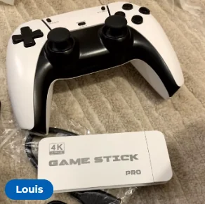 Customer photo of the game stick and controller