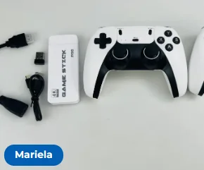 Game stick, receiver, cables and controller laid out on a table